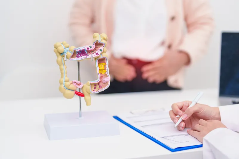 Woman consulting a Crohn's disease specialist during an appointment