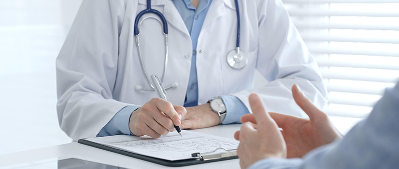 Patient discussing health concerns with a doctor